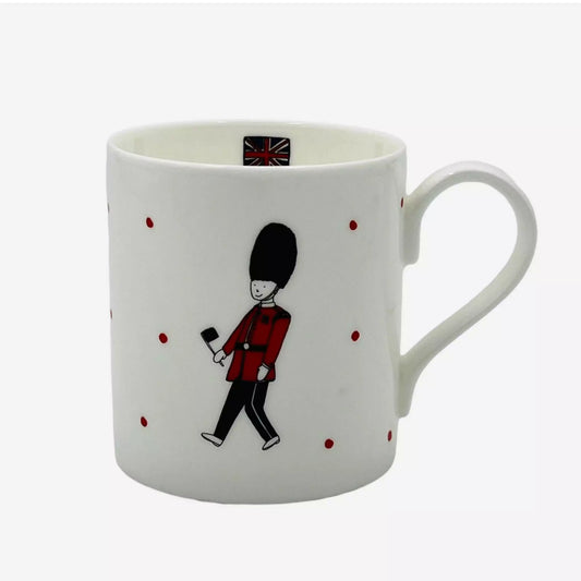 A mug with an illustration of a British guard