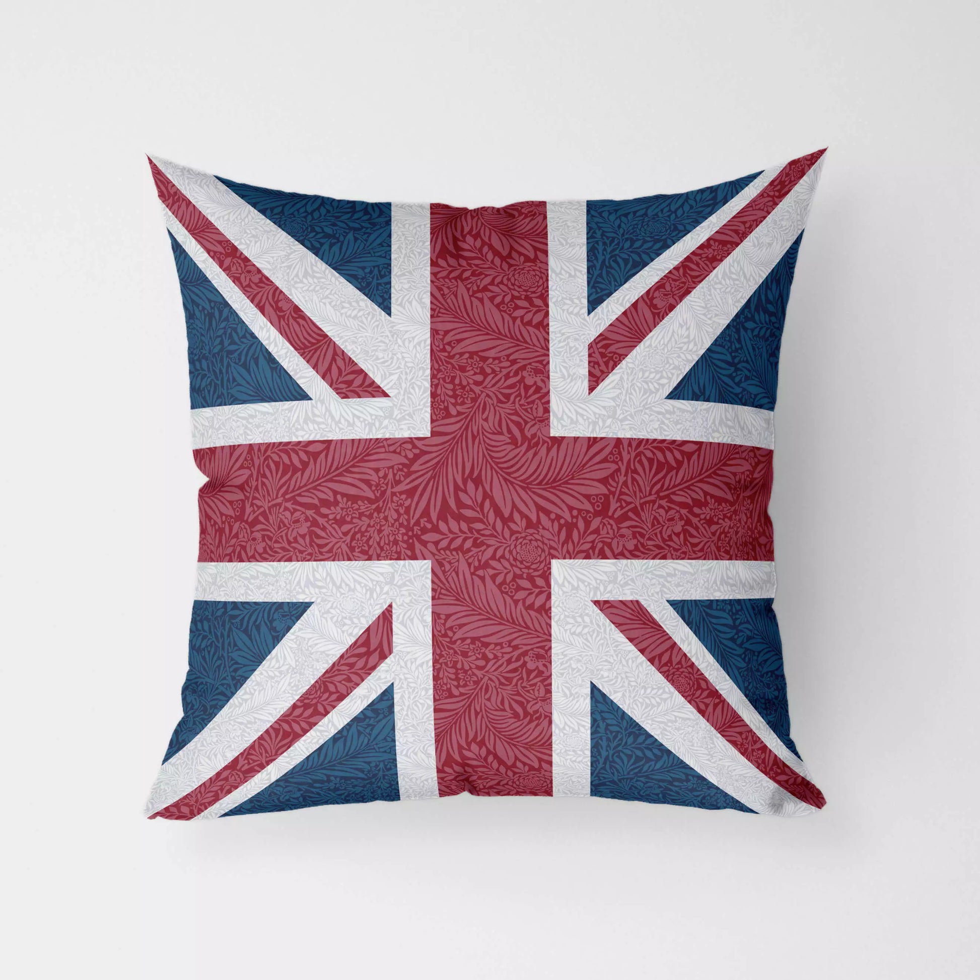 A cushion featuring the Union Jack on a William Morris Larkspur pattern water resistant fabric.