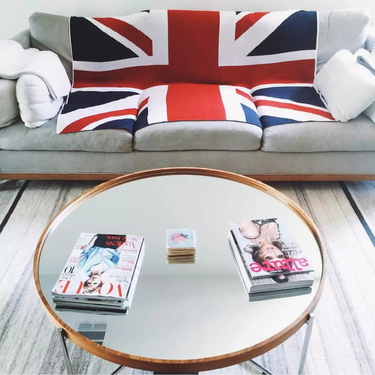 An open throw featuring the Union Jack in a living room.