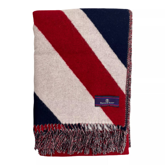 A folded Merino Wool Throw featuring the Union Jack, on a white background